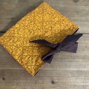 Handmade quilted book sleeve